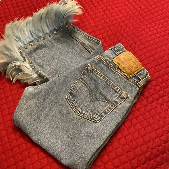 Vintage Levi’s redesign by Charlotte f with real feather detail o de legs sides